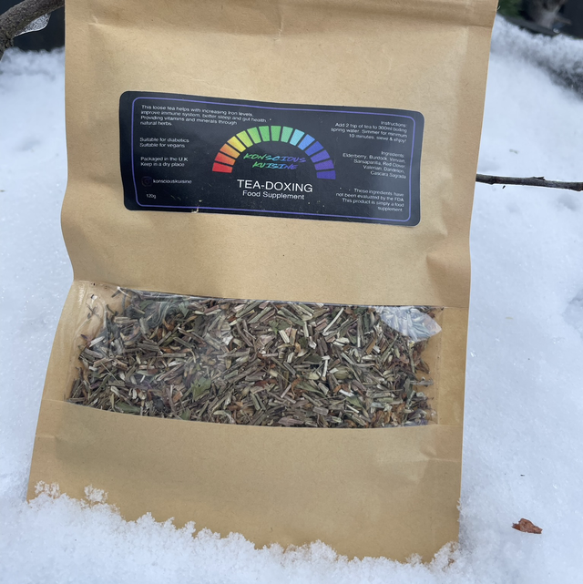 Tea packaging with a label on a snowy background